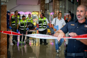Police and rescue forces outside the scene of a stabbing attack in Karmiel, northern Israel, July 3, 2024. 
