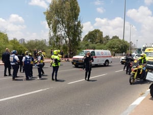 Rescue and police officials at the scene of the attack.