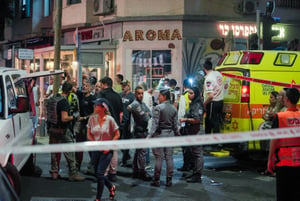 Israeli security and rescue personnel at the scene of a drone explosion in Tel Aviv on July 19, 2024