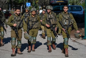 Members of an Emergency Squad seen training with the Israeli soldiers in northern Israel