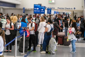  Holiday travelers wait in line to check-in at the Los Angeles International Airport