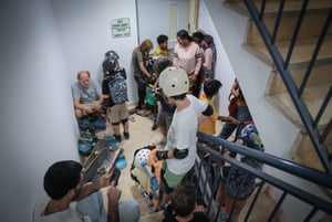 Israelis take cover inside a bomb shelter as a siren alert is sounded in Tel Aviv