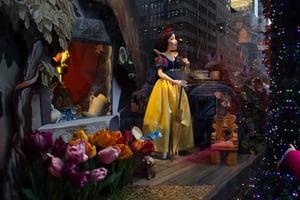 Snow White with broom in Saks Fifth Avenue’s holiday window display