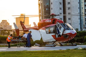 Medics evacuate from a helicopter a wounded Israeli soldier at the Beilinson hospital in Petah Tikva 