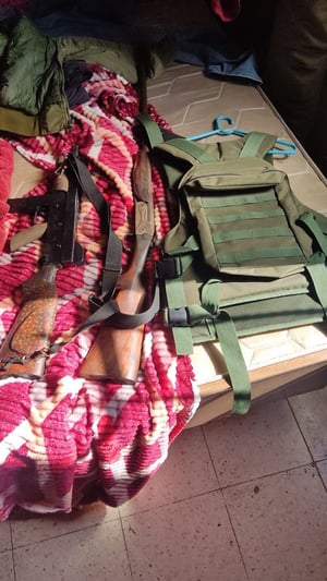 Weapons seized in anti-terror sweep.