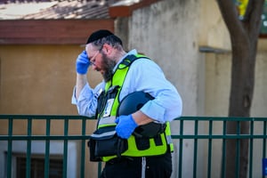 Member of the Zaka team seen near Kibbutz Kfar Aza, near the Israeli-Gaza border, in southern Israel, November 2, 2023. 