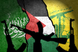  Flags of Palestine and terrorist organizations Hamas, Hezbollah painted on the concrete wall