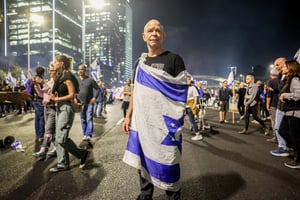 Israelis block the Ayalon Highway in Tel Aviv as they protest against Israeli Prime Minister Benjamin Netanyahu's decision to fire Defense Minister Yoav Gallant, November 5, 2024