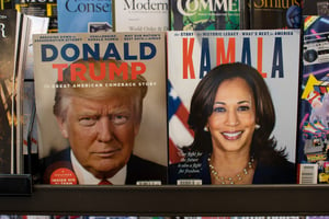 Magazines published by A360 Media with presidential nominees Donald J. Trump and Kamala Harris on the covers are displayed at a bookstore in Tigard, Oregon