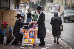 Ultra orthodox jews walking in the street in the Ultra orthodox town of Bnei Brak