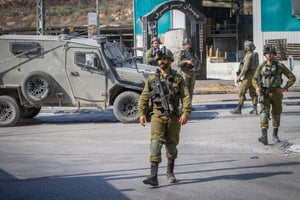 Israeli soldiers near the scene of a shooting, near the West Bank settlement of Shavei Shomron