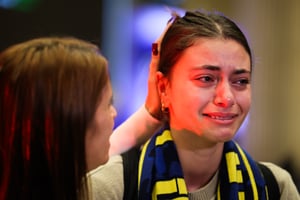 Maccabi Tel Aviv fans arrive at Ben Gurion international airport, near Tel Aviv, November 8, 2024.