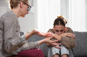 Mother and difficult teenage daughter at home