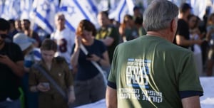 Man wearing a Brothers in Arms T-shirt