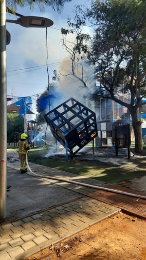 Torched playground equipment in Bnei Brak