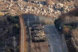 Israeli soldiers on the border fence on the Israeli border with Syria, northern Israel, December 9, 2024