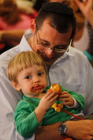 Child eating donut