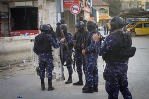 Palestinian security forces enforce the law in the center of Jenin and its camp in the West Bank, December 16, 2024