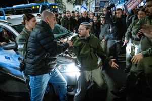 Demonstrators clash with police at the entrance to Jerusalem, during a protest against the current hostage deal with Hamas, in Jerusalem, January 13, 2025