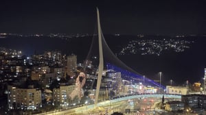 The Jerusalem Chords Bridge, lit up with the hostages ribbon.