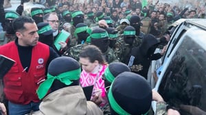 Doron Steinbrecher exits Hamas captivity and enters the waiting Red Cross vehicle