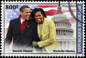 Milan, Italy - January 24, 2022: Barack and Michelle Obama on postage stamp