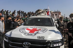 Hamas, Islamic Jihad and thousands of Gazans seen outside the house of Sinwar in Khan Younis, Gaza, where two Israeli hostages- Arbel yehud and Gadi Mozes were released to the Red Cross, January 30, 2025. 