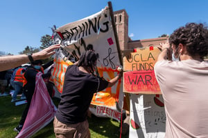 Pro-Palestinian protesters gathered at an encampment at UCLA, on Friday, April 26, 2024