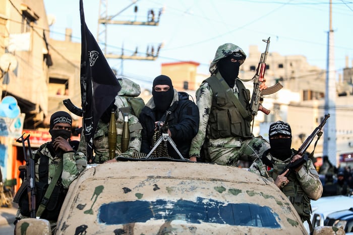 Palestinian militants take part in an anti-Israel military show in Khan Younis in the southern Gaza Strip, on February 17, 2020. 