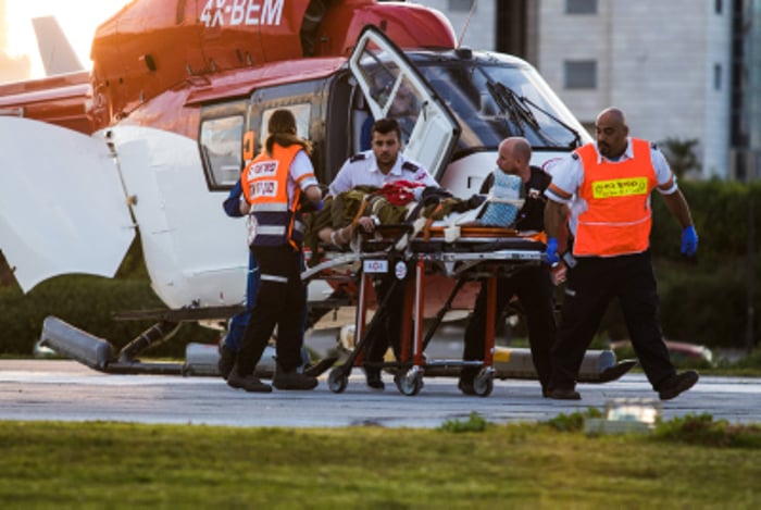 Medics evacuate injured Israeli soldier 