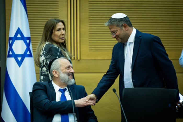 Israeli minister of National Security Itamar Ben Gvir and head of the Shas party Aryeh Deri in the Israeli parliament, 2023. 