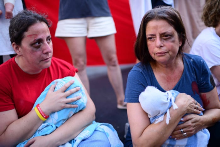 Demonstrators protest for the release of Israelis held hostage in the Gaza Strip, outside Hakirya Base in Tel Aviv, July 7, 2024. 