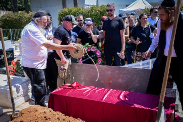 Family and friends attend the funeral Yevgeny Ferder who was killed from a drone attack, in Rishon Lezion, July 21, 2024.