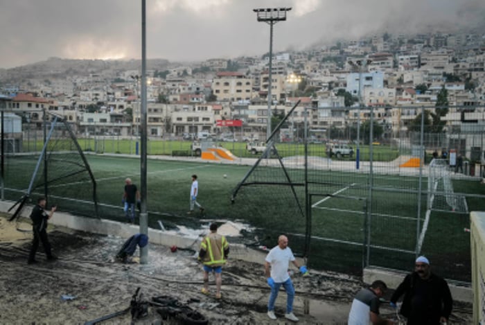 Israeli rescue forces at the site of a Hezbollah missile attack in the druze village of Majdal Shams, July 27, 2024. 