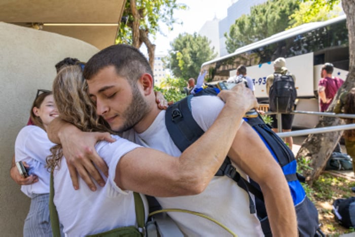 Young Israelis arrive at the IDF Bakum Reception and Sorting base in Tel Hashomer in Israel, on April 18, 2024.