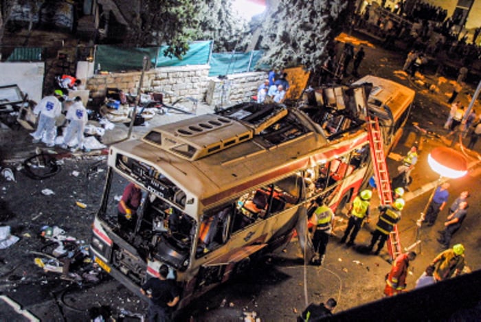 Rescue forces and police at the scene of a suicide bombing attack in a crowded bus, at Shmuel HaNavi Neighborhood in Jerusalem