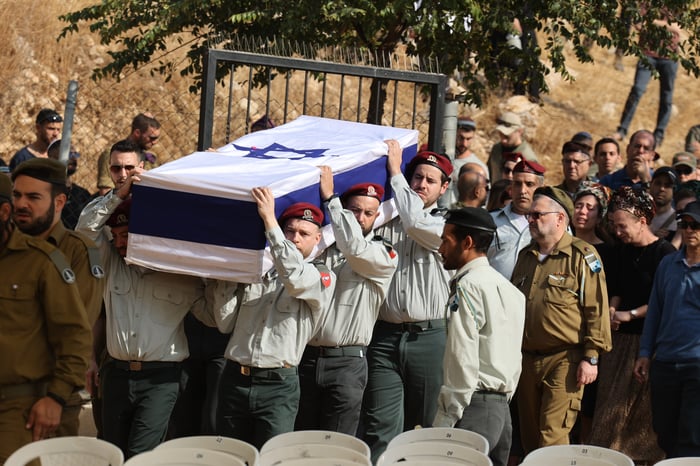 Family and friends of Israeli soldier Master sergeant (res.) Yedidya Bloch attend his funeral in Moshav Mevo Horon on October 30, 2024 