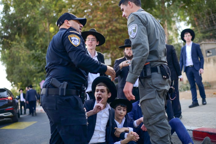 Ultra orthodox Jews clash with police during a protest against the drafting of ultra orthodox jews, October 31, 2024