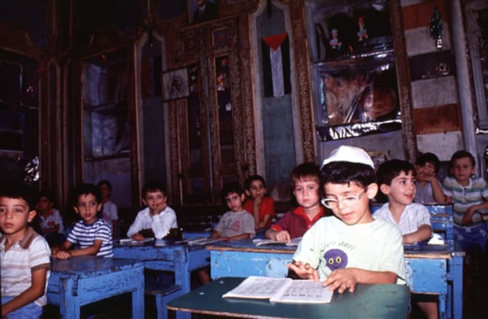 Jewish pupils in the Maimonides school in 'Amārah al Juwwānīyah, in Damascus. 