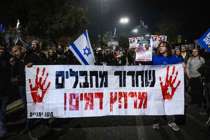 Demonstrators protest against the current hostage deal with Hamas outside the Prime Minister's Office in Jerusalem, January 15, 2025.