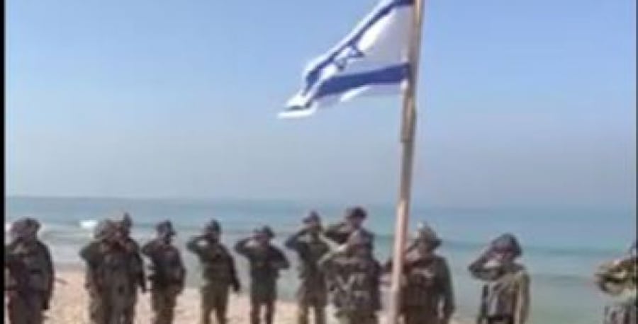 Waving the flag and singing the anthem in Gaza.