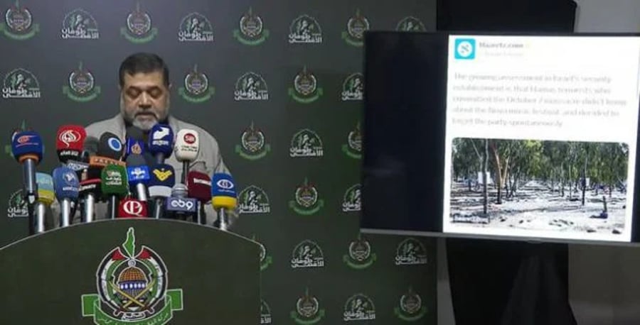 Hamas press conference using a Haaretz tweet in support of claims Israel committed the Re'im massacre.