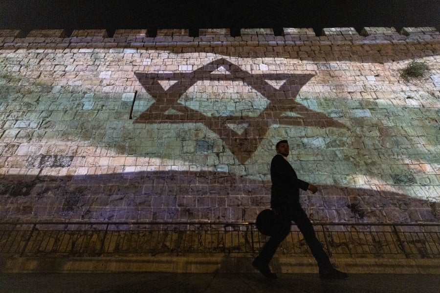 Divided on whether actions or views against Israel or Israelis count as antisemitism. Israeli flag broadcast on the Old City.