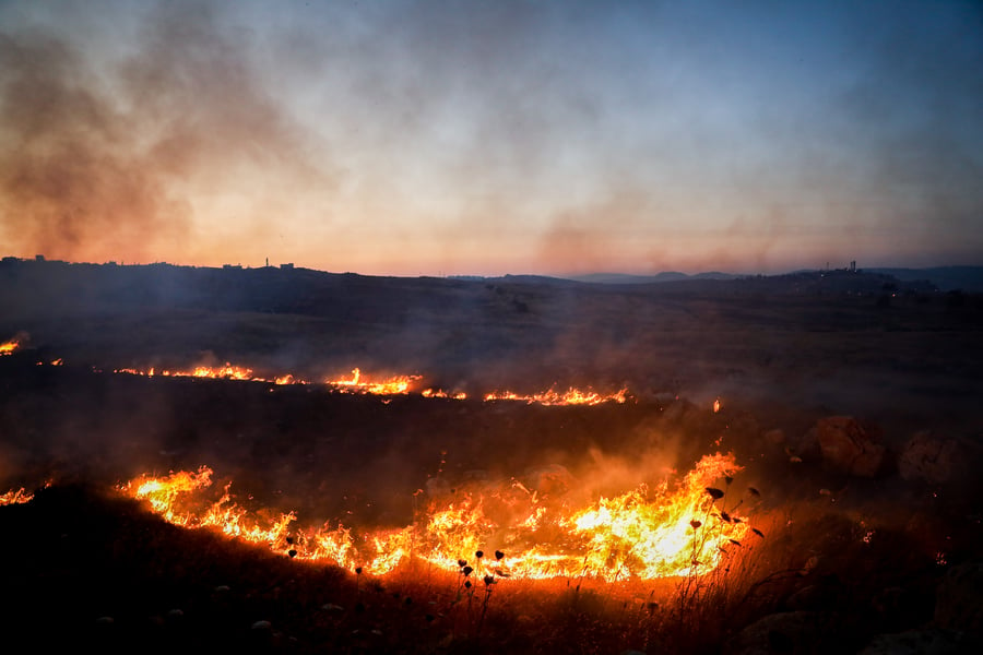 Fire started in clash between settlers and Palestinians in Judea and Samaria.