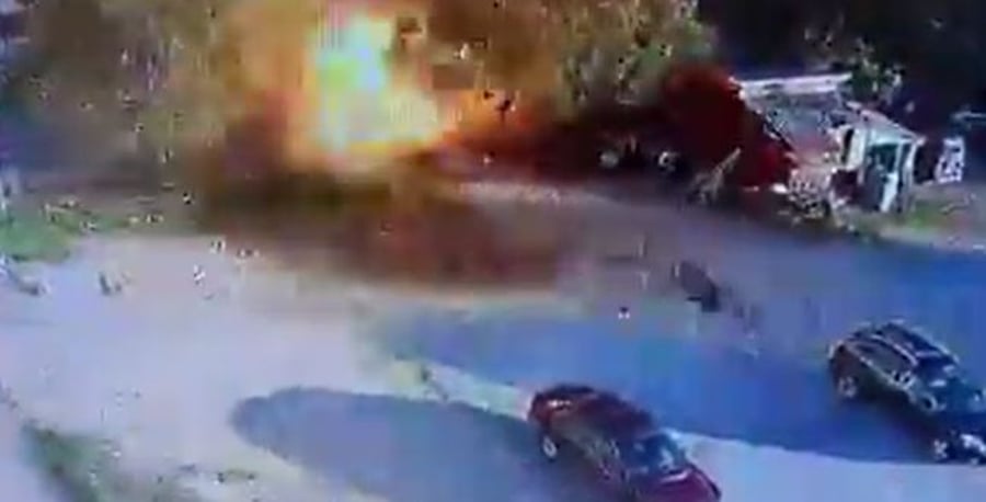 The car containing Hezbollah activists blowing up.