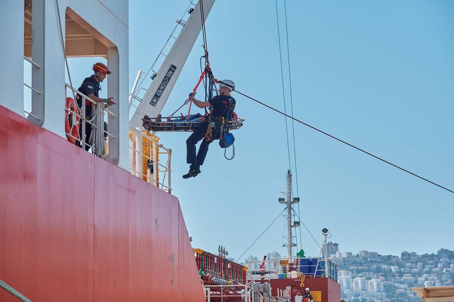 "Rescuing" ship personnel in distress.