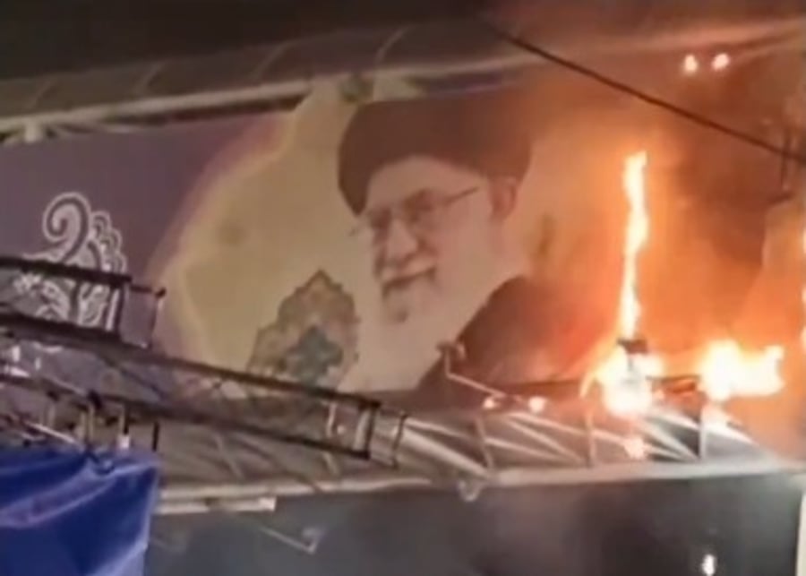 Burning the image of the Supreme Leader.
