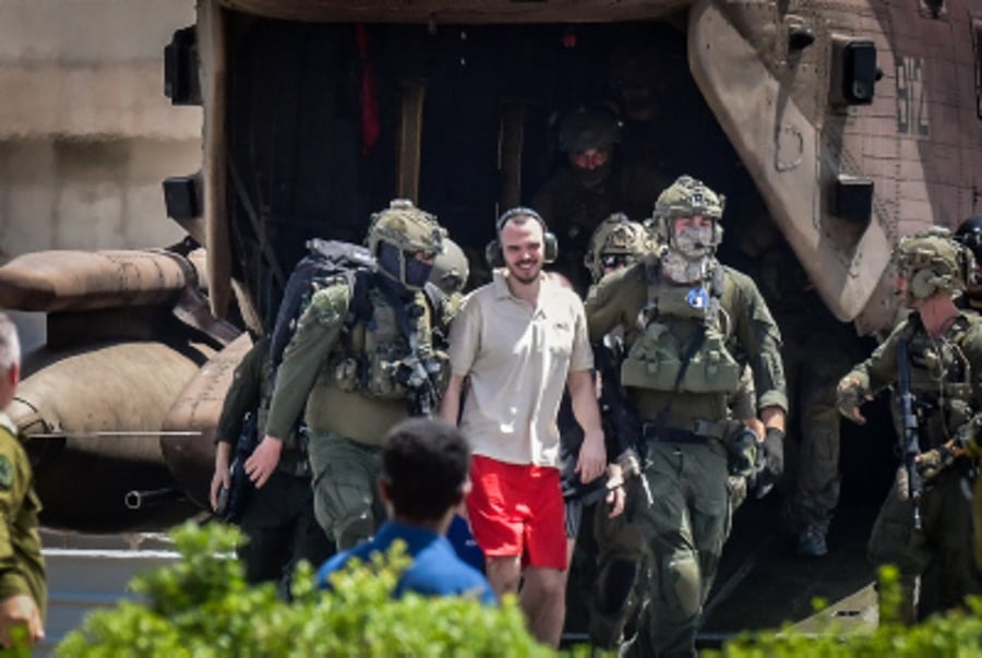 Hostages Andrey Kozlov and Almog Meir, freed from captivity in the home of a Palestinian journalist.