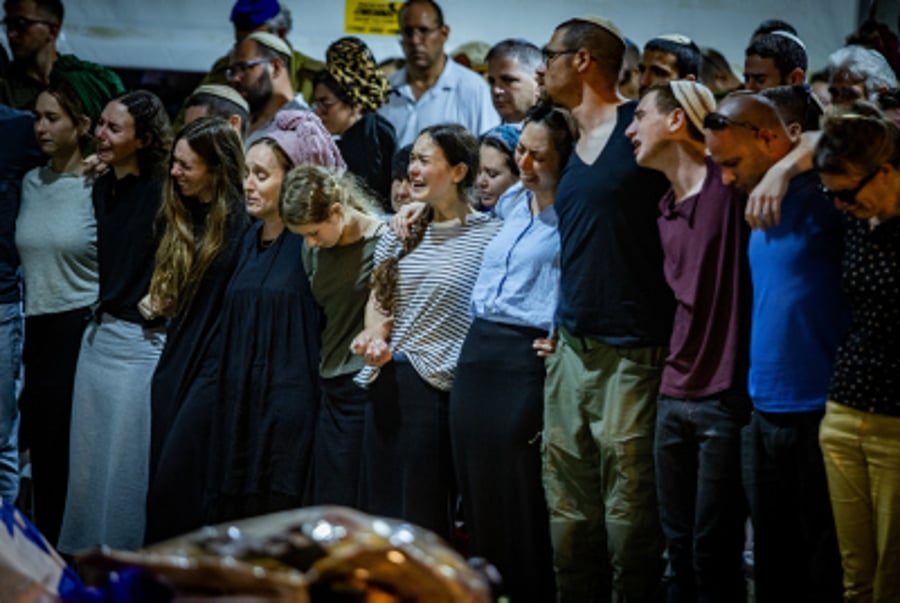 Family and friends of Israeli soldier Senior Staff Sergeant Major Elon Waiss attend his funeral at the Mount Herzl Military Cemetery in Jerusalem on June 16, 2024.  