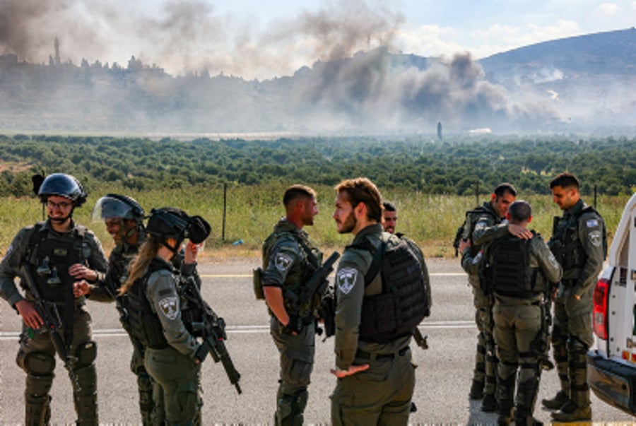 Israeli security forces guard the village of Duma in the West Bank, after settlers entered the village following the murder of 14-years-old Binyamin Achimeir, April 13, 2024. 